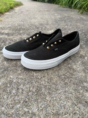 Vans Black Canvas Slip-Ons with Gold Stud Accents